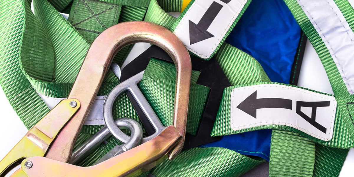 Abseiling rope system and safety harness before setup in Uganda